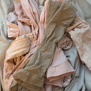 7 pairs of ballet tights- 6 pink 1 nude